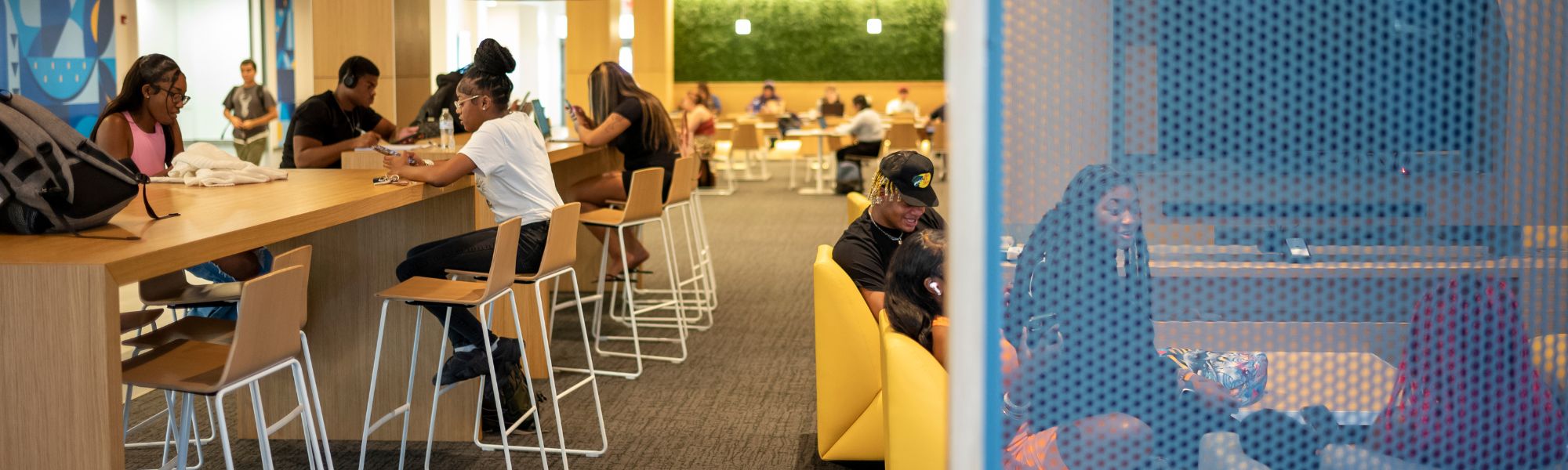 Students in Student Union sitting area.